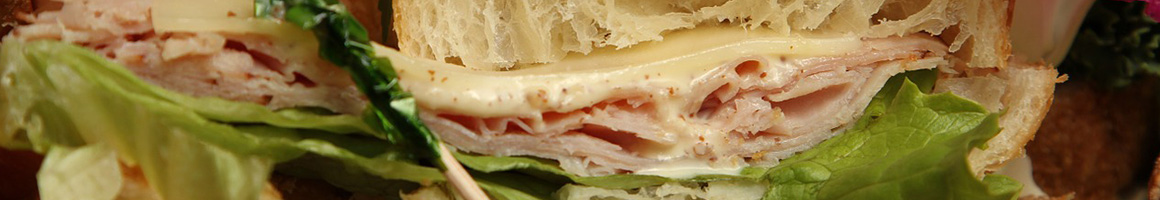 Eating Deli Sandwich at B & C Grocery restaurant in Fort Bragg, CA.